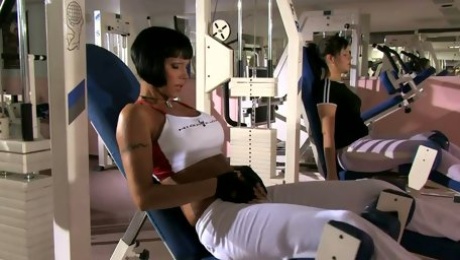 Athletic bitch Valentine Demy works out in a gym and later sucks two dicks