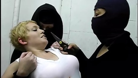 Short-haired kinkster dragged to bondage room by two S and M