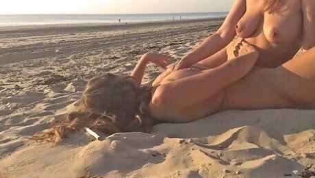 Naked Lesbian Girls having Public Beach Sex for everyone to see